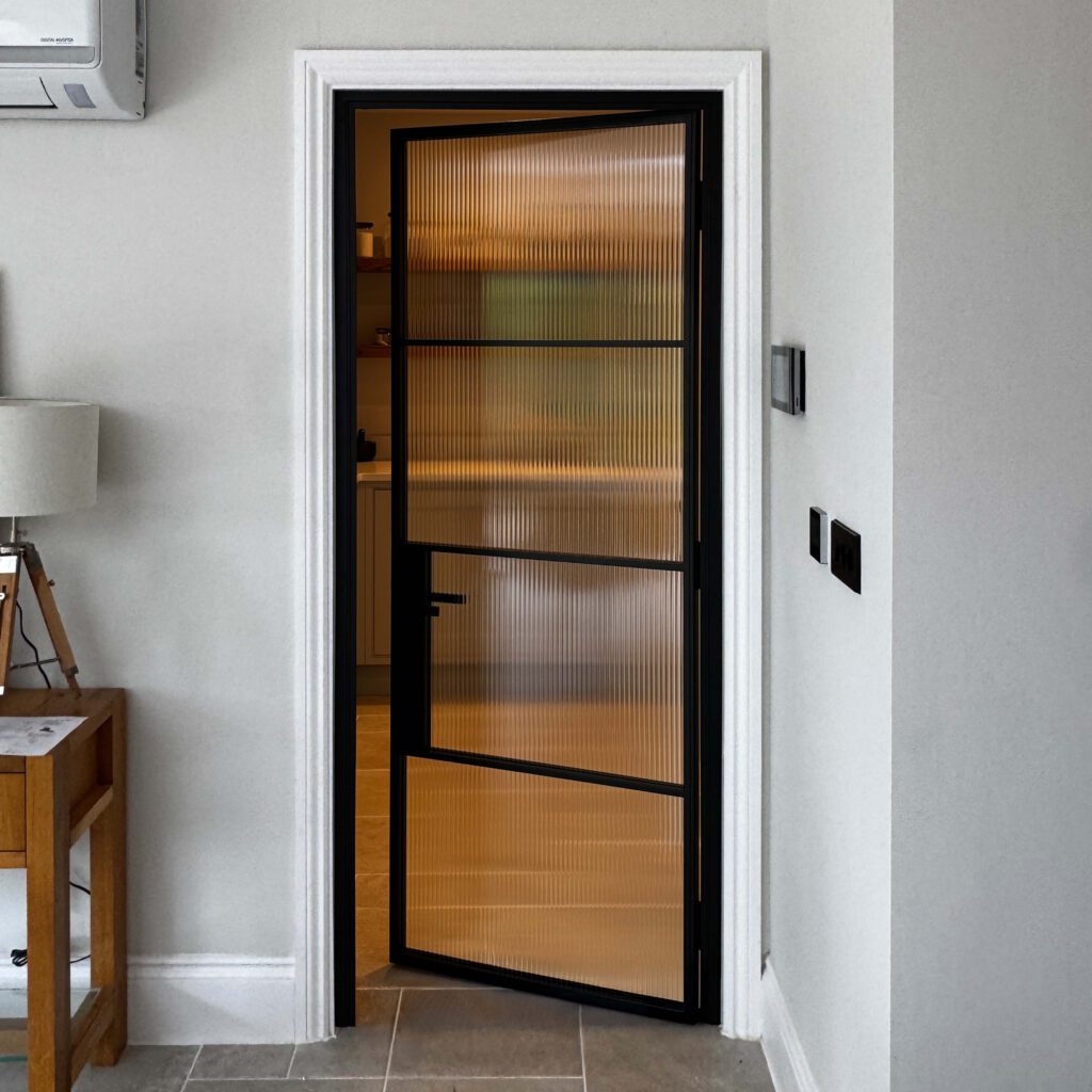 Fluted Glass Pantry Door – Bespoke Black Steel Design